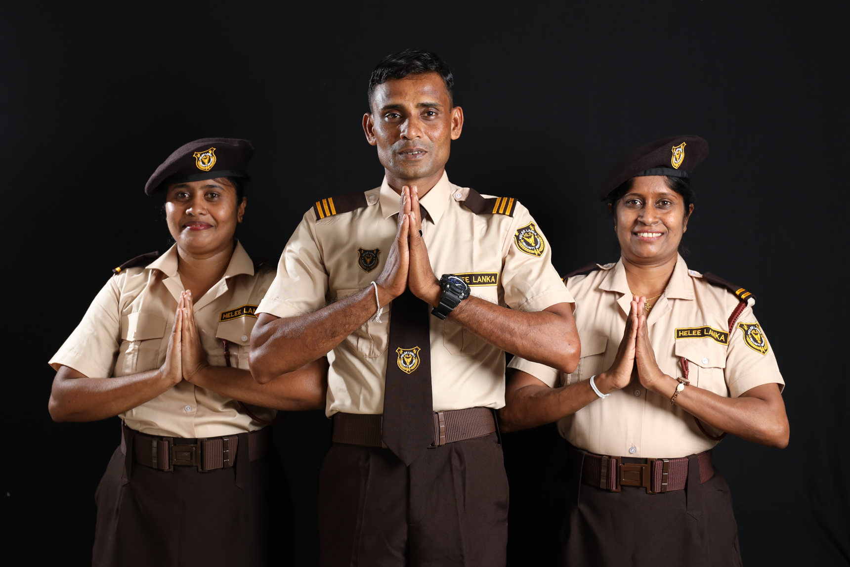 Chests of two security guards standing