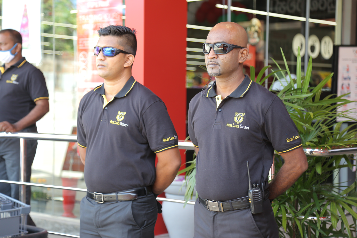 Two security guards standing